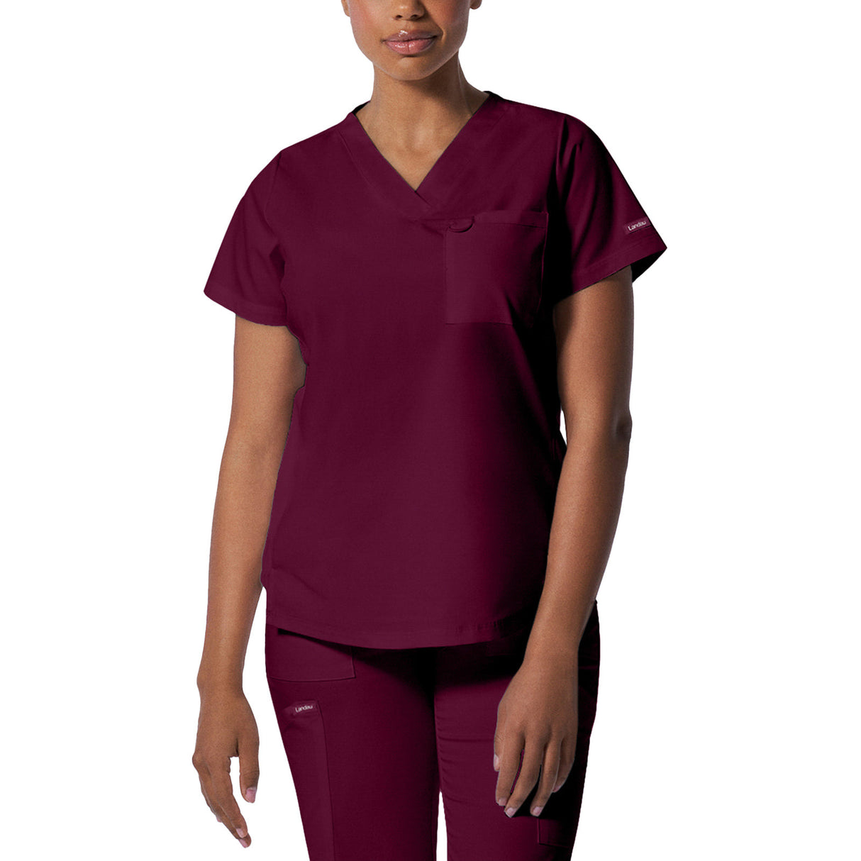 Landau Women's Two-Pocket Back Princess Seamed V-Neck Top